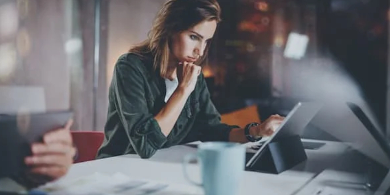 A Business Woman Working With His Laptop.