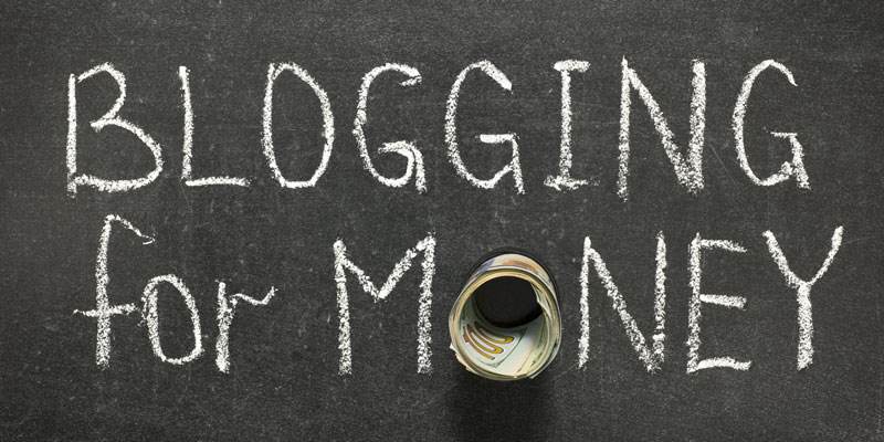 A Text Written That Blogging For Money In A Black Board.